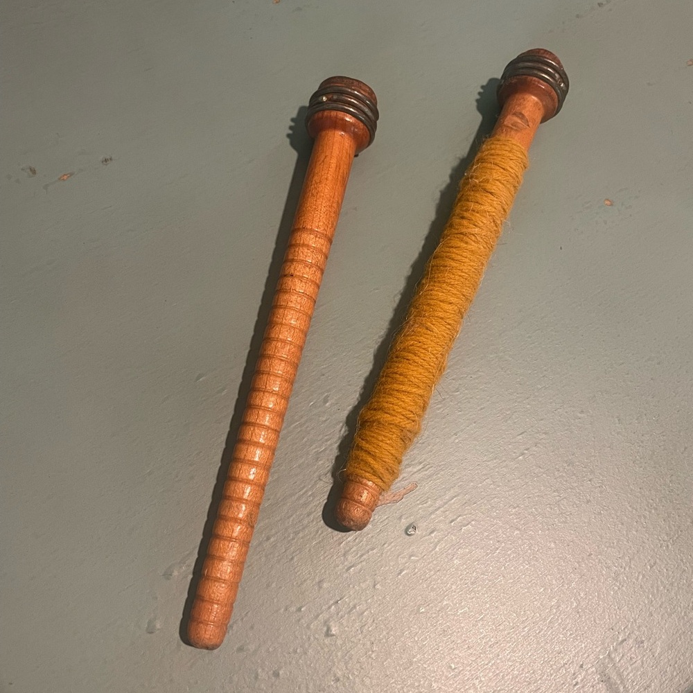 Wooden Spindles with Mustard Yarn